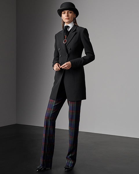 Woman in purple plaid wide-leg pants