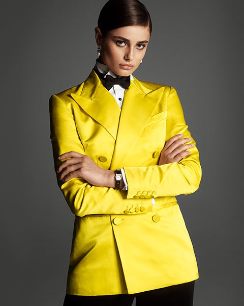 Woman in yellow double-breasted tuxedo jacket